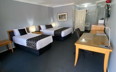Accessible Accommodation Maitland. One spacious accessible room, with a queen bed & single bed & a step-free bathroom with shower chair.